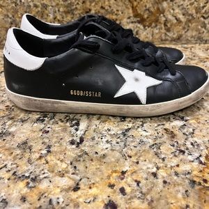 Black and white Golden Goose Superstars. Size 40